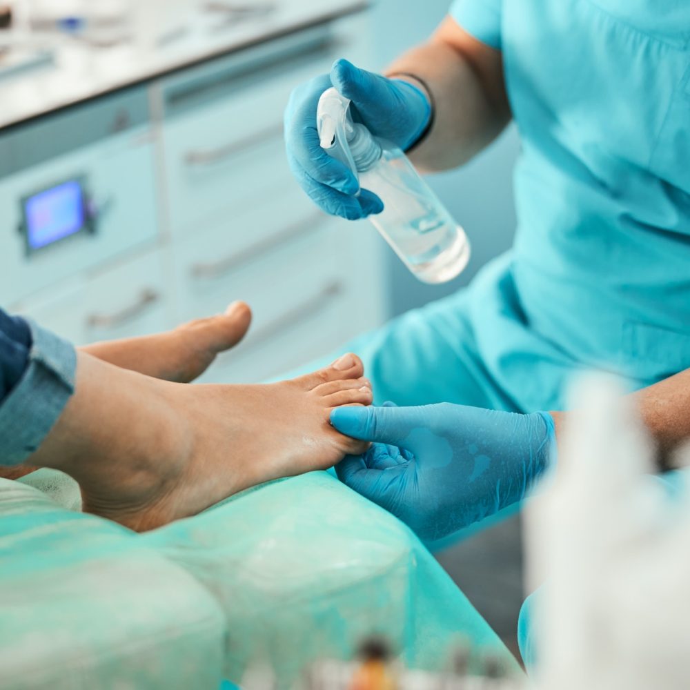 Close up of podiatrist preparing nails for procedure